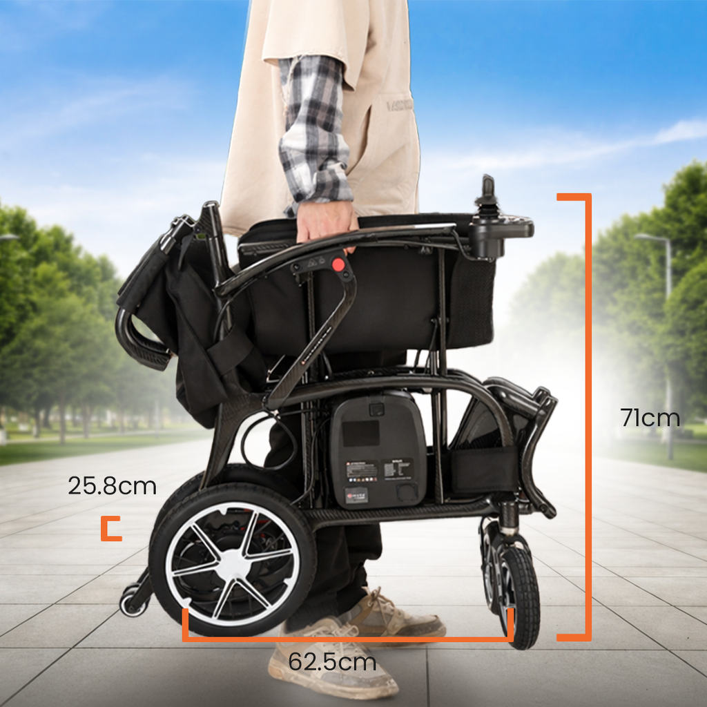 Compact electric wheelchair being pushed on a sidewalk with measurement details.